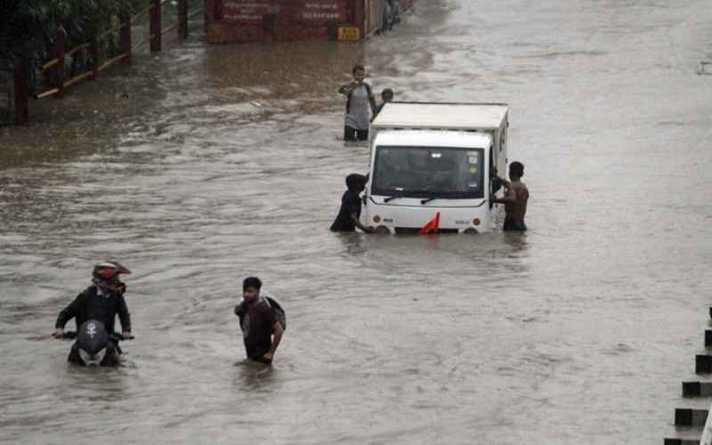 Heavy Rains Cripple Delhi-NCR: Schools Shut, Traffic Disrupted, and Flights Diverted